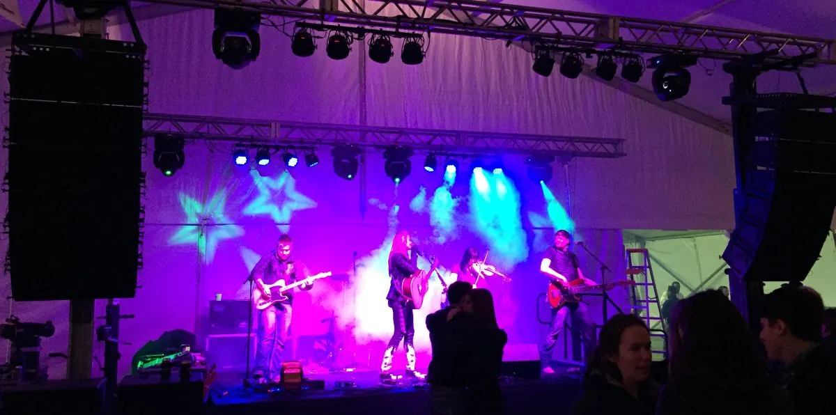 Covered outdoor rodeo and tent event staging